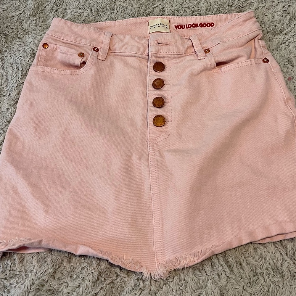 Alice + Olivia blush pink denim skirt that can be dressed up or dressed down.